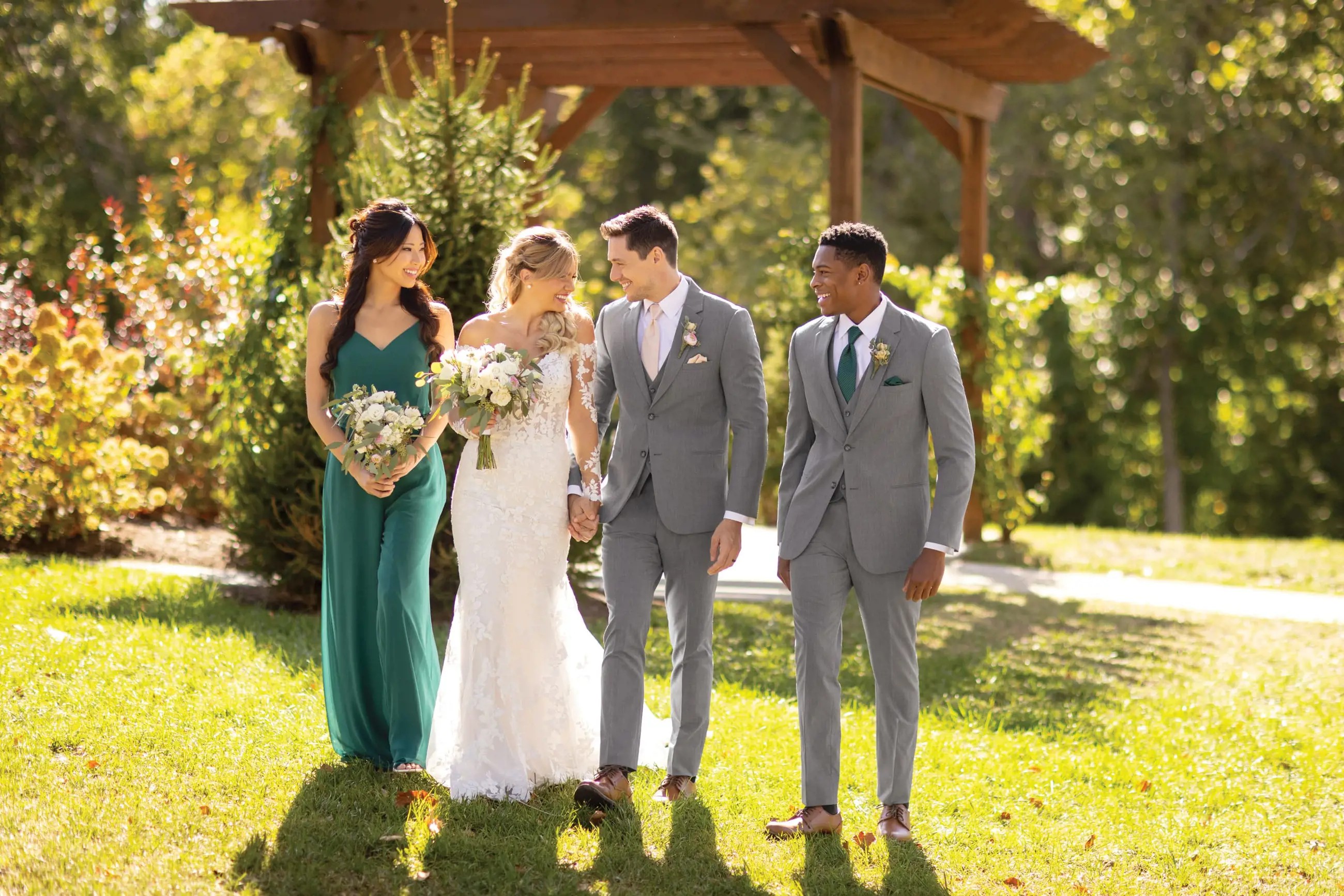 Models wearing a gowns and a suits