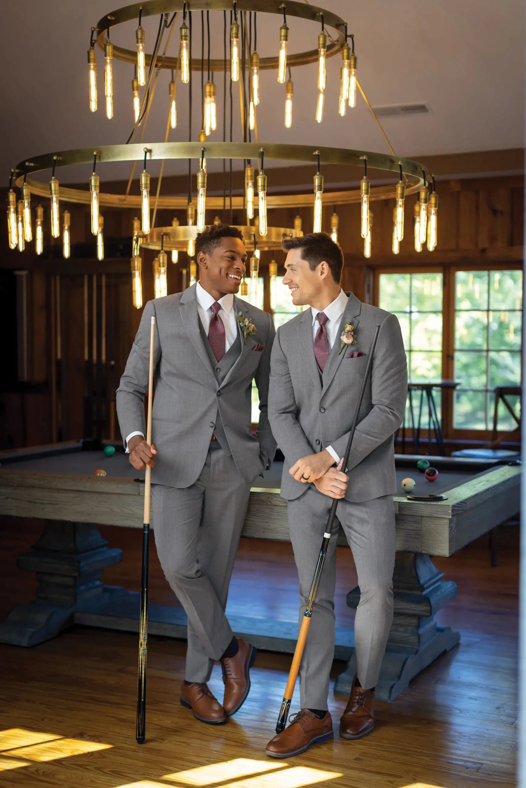 Models wearing a gray suits