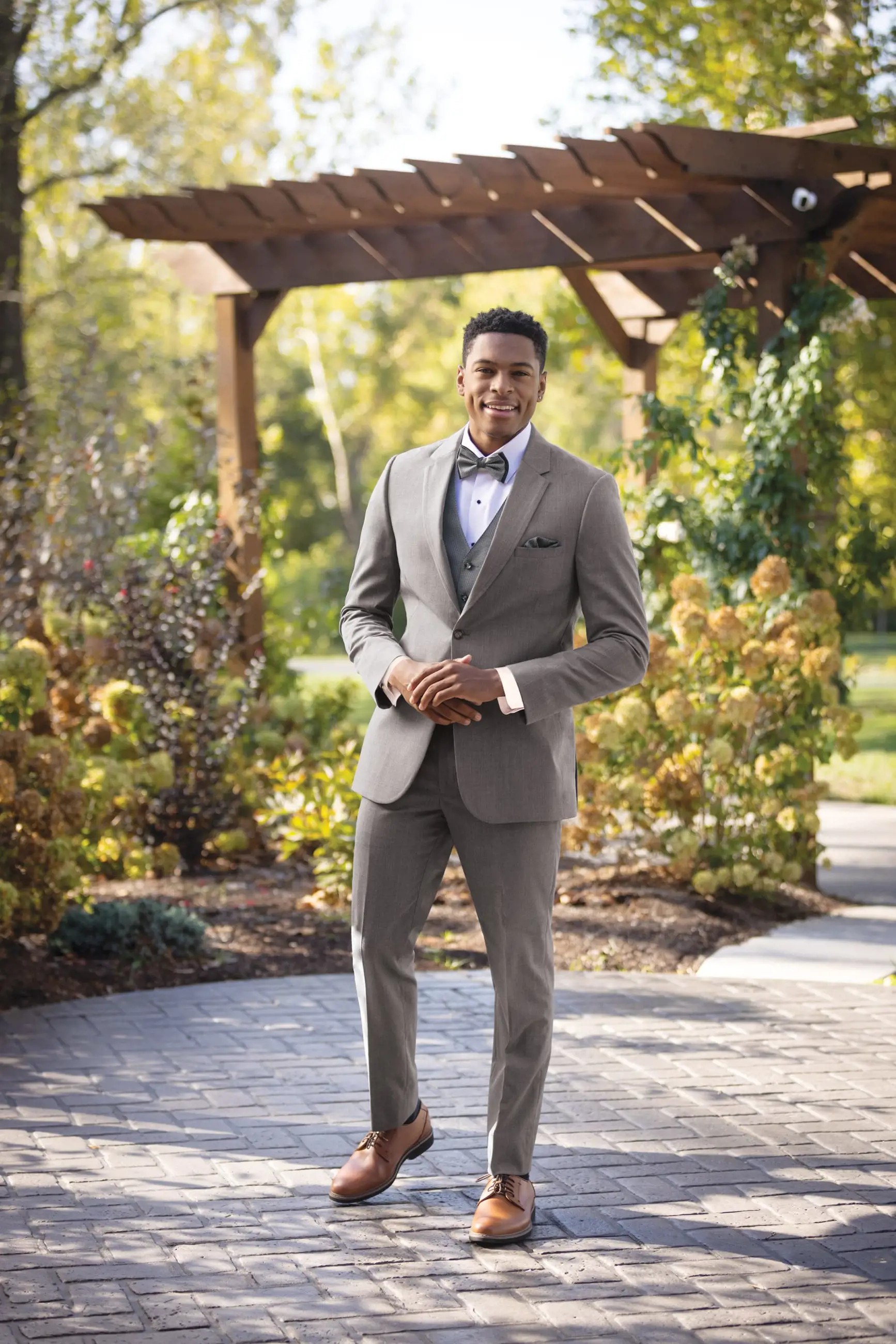 Model wearing a gray suit