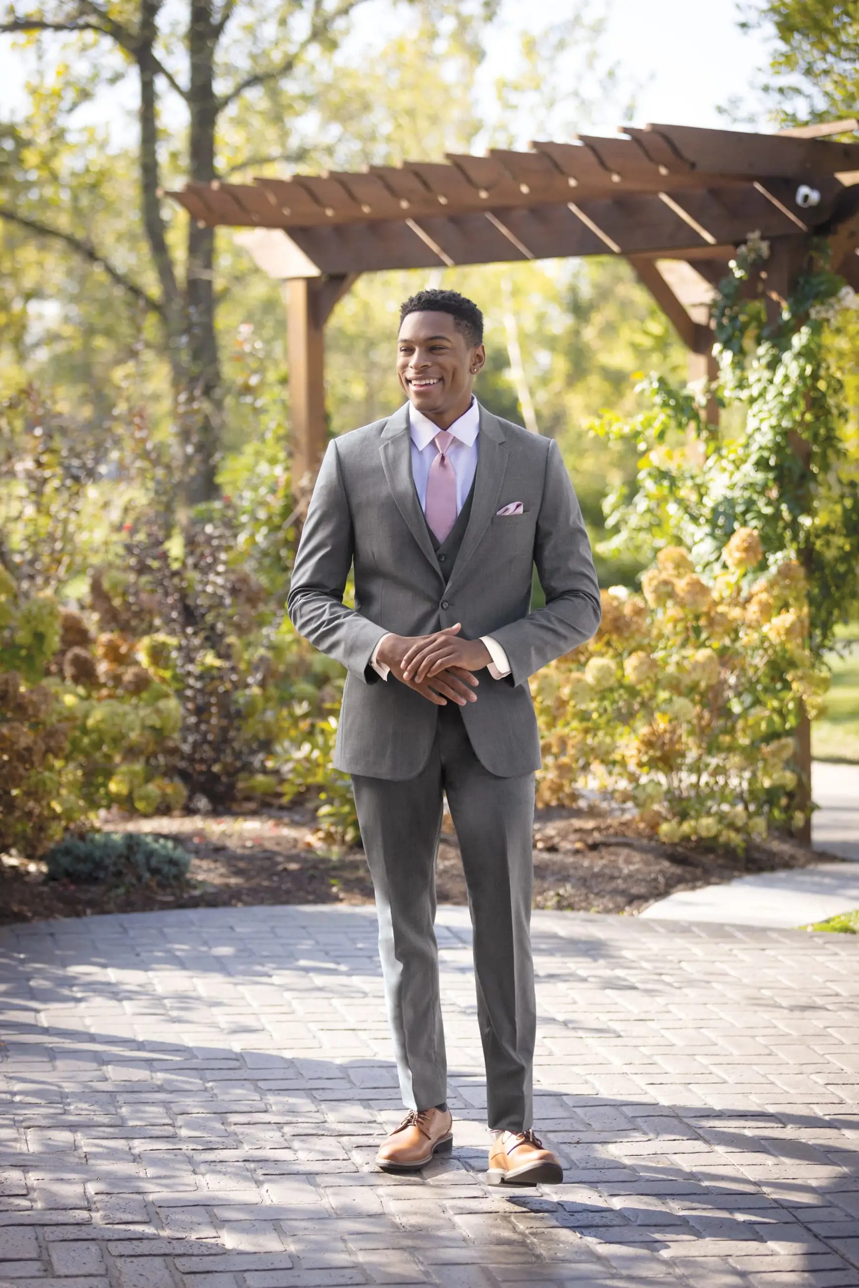 Model wearing a gray suit