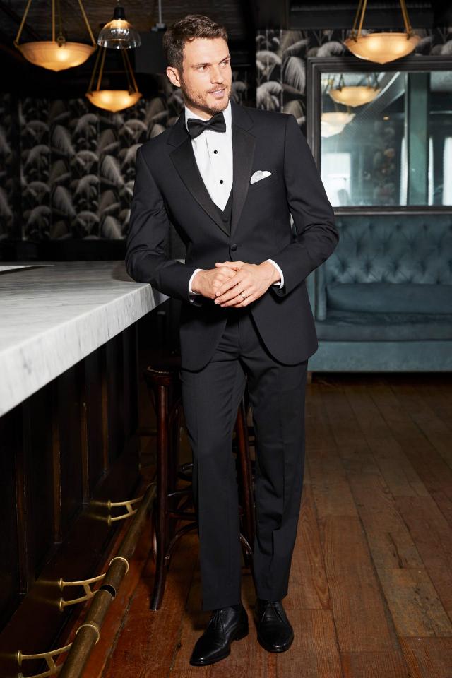 Model wearing a black suit