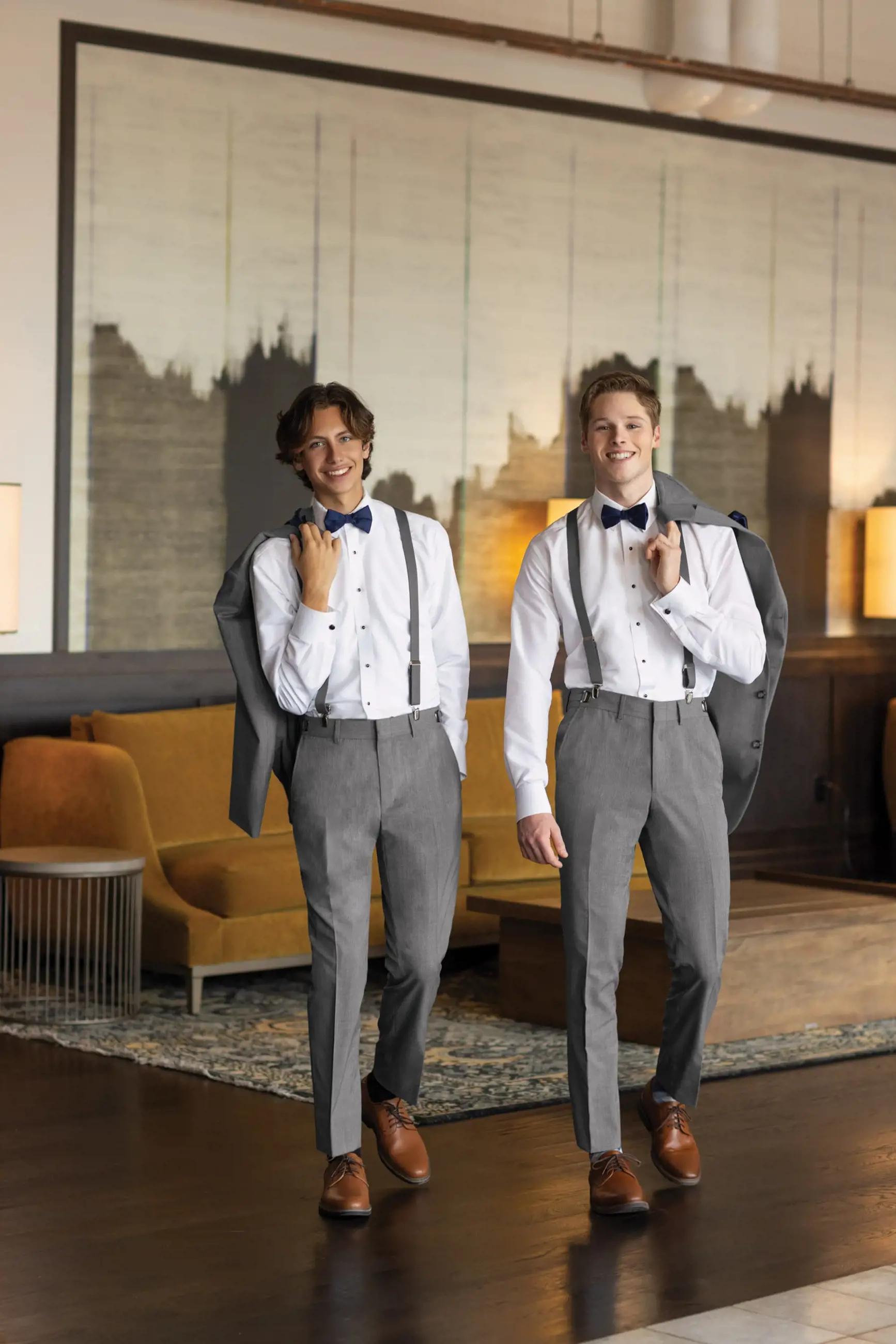 Models wearing a gray suits